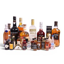 Mixed alcohol, including Monkey Shoulder, blended scotch whisky, Woodford Reserve, Kentuck...