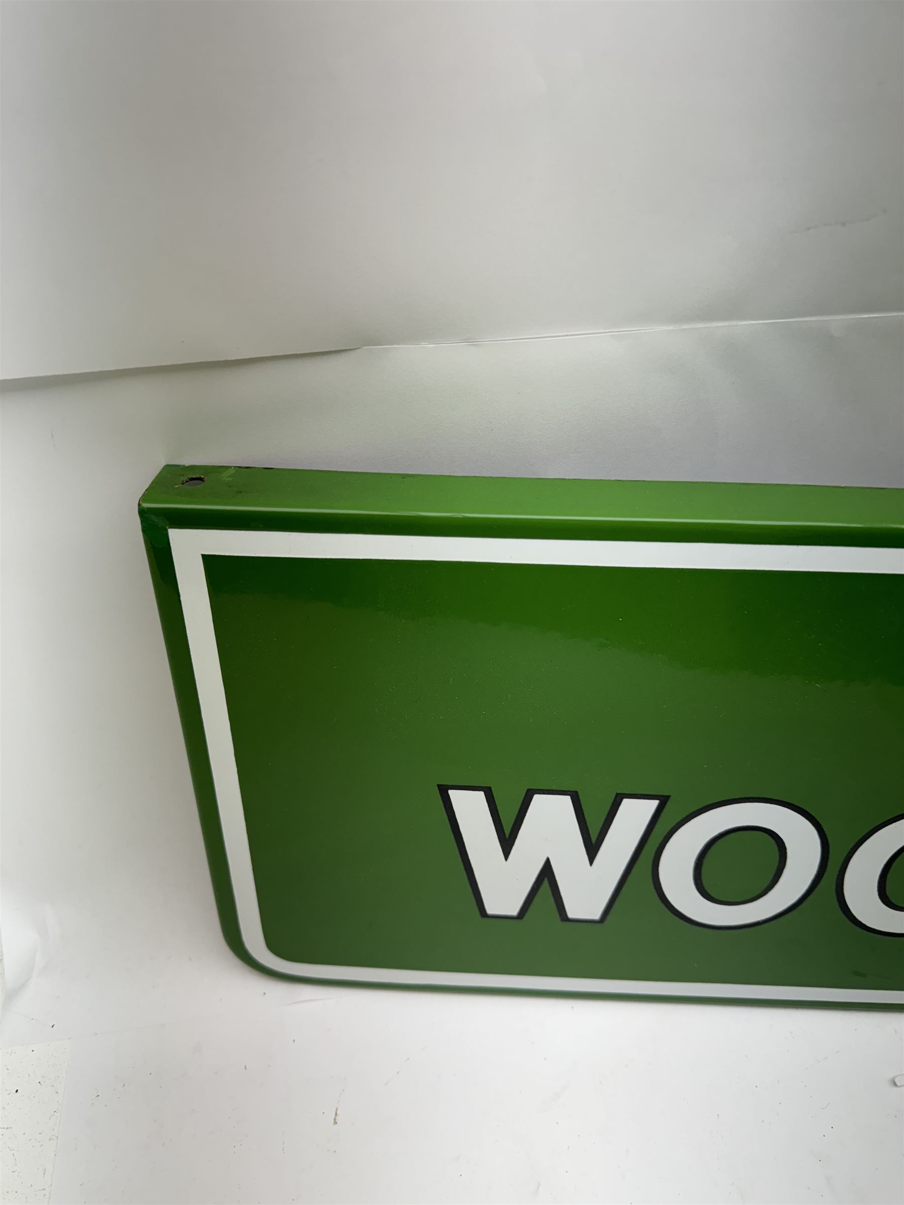Wills's Woodbine enamel advertising sign, with white and black lettering on a green ground, W73.5cm, H23cm