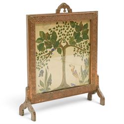 Arts & Crafts copper framed fire screen, the framed decorated in relief with with repeating waves design and floral sprigs to the corners, the central panel painted with stylised birds amongst trees, H80cm  