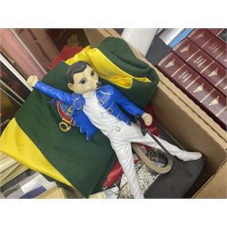 Mostly Queen and Freddie Mercury interest items, including pin badges, newspaper cuttings, diecast 'promotional' vehicles, special edition Pop Rocks figure of Freddie Mercury, VHS tapes, two charity certificates signed by Brian May and Roger Taylor, poster etc, in two boxes 