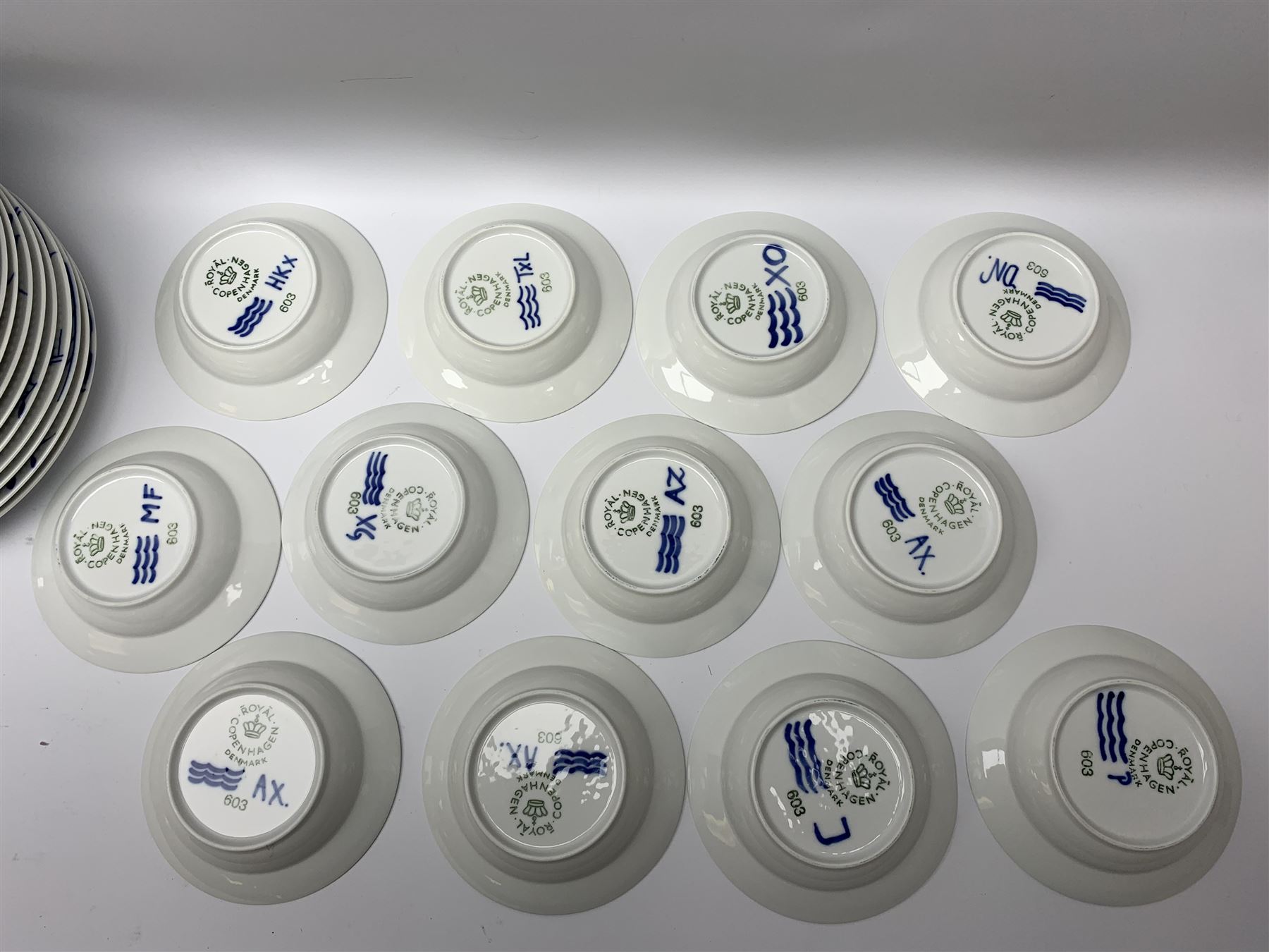 Royal Copenhagen tea and dinner service for twelve place settings, decorated in the Mega Blue Fluted pattern, pattern number 622, comprising dinner plates, salad plates, bowls with pierced rim, smaller bowls, tea cups, and saucers, dinner plates D27.5cm, salad plates D22cm