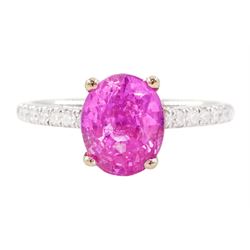 18ct white gold pink sapphire and diamond ring, single oval cut pink sapphire of approx 2....