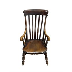 Late 19th century elm farmhouse armchair, high lath back raised on turned supports united by stretcher