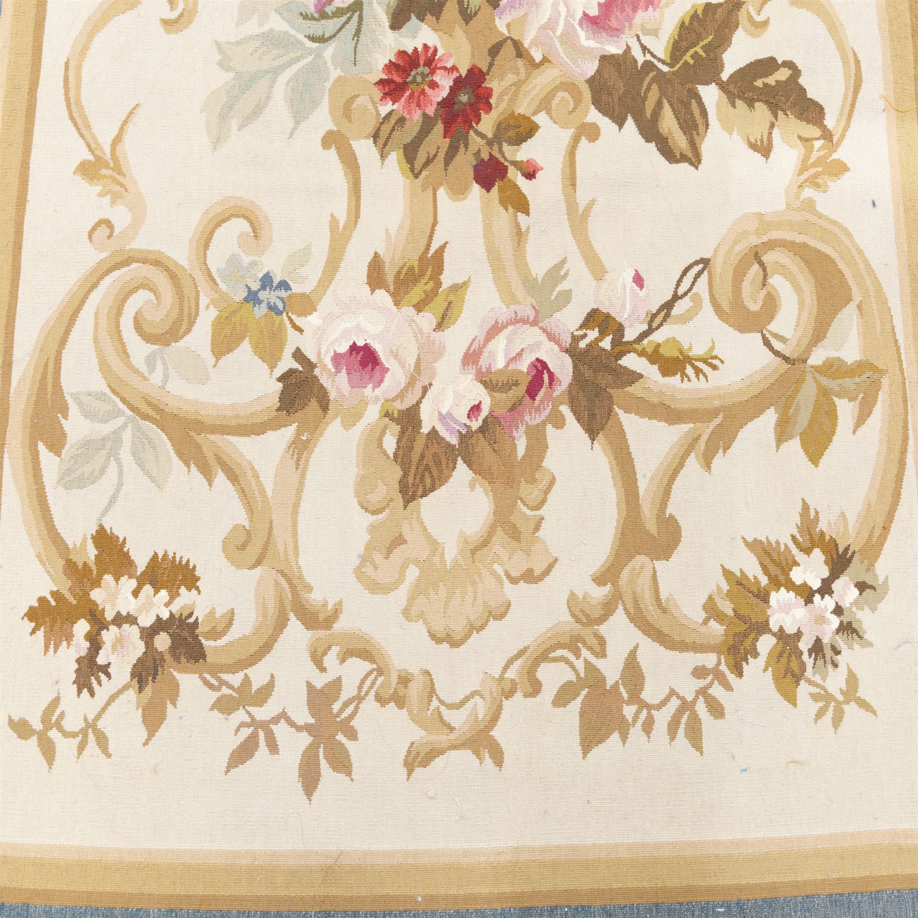Aubusson flatwoven runner, cream field decorated with floral bouquets and scrolling foliate cartouche, within pale blue outer border and ochre guard bands