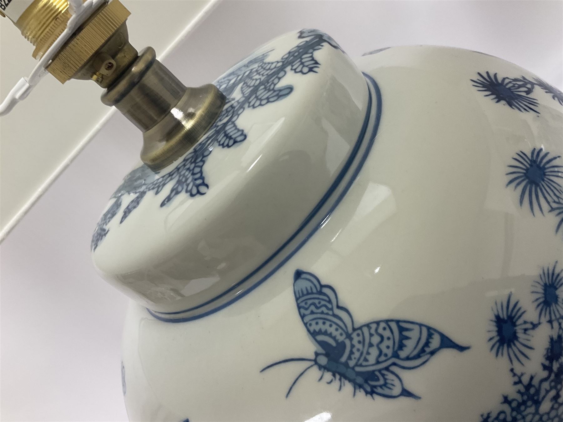 Pair of Chinese table lamps of baluster form, each decorated with landscape scene, raised upon gilt circular base, including shade H63cm