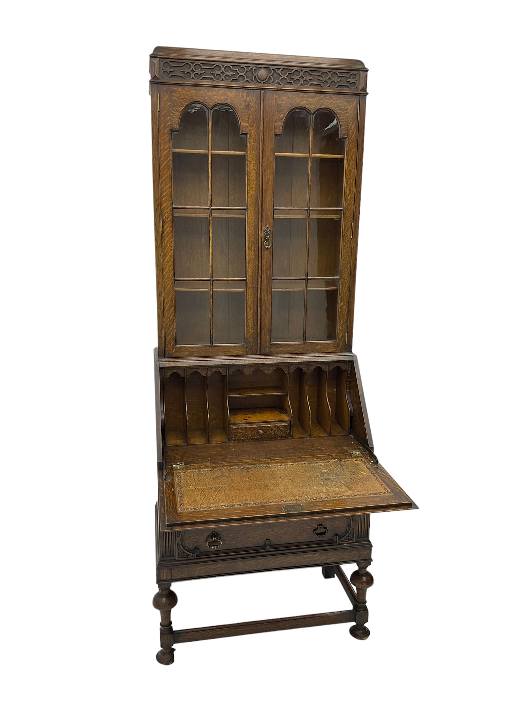 Early to mid20th century oak bureau bookcase, blind fretwork frieze