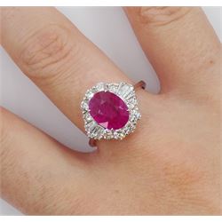 18ct white gold oval mix cut ruby, tapered and round brilliant cut diamond cluster ring, stamped, ruby 1.94 carat, total diamond weight 0.88 carat, with World Gemological Institute Report