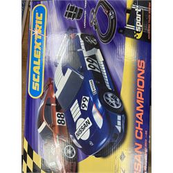 Quantity of Scalextric, including various sets; Digital Driver, Nissan Championship, Moto GP1, App Race control set and a collection of track and other accessories as per list