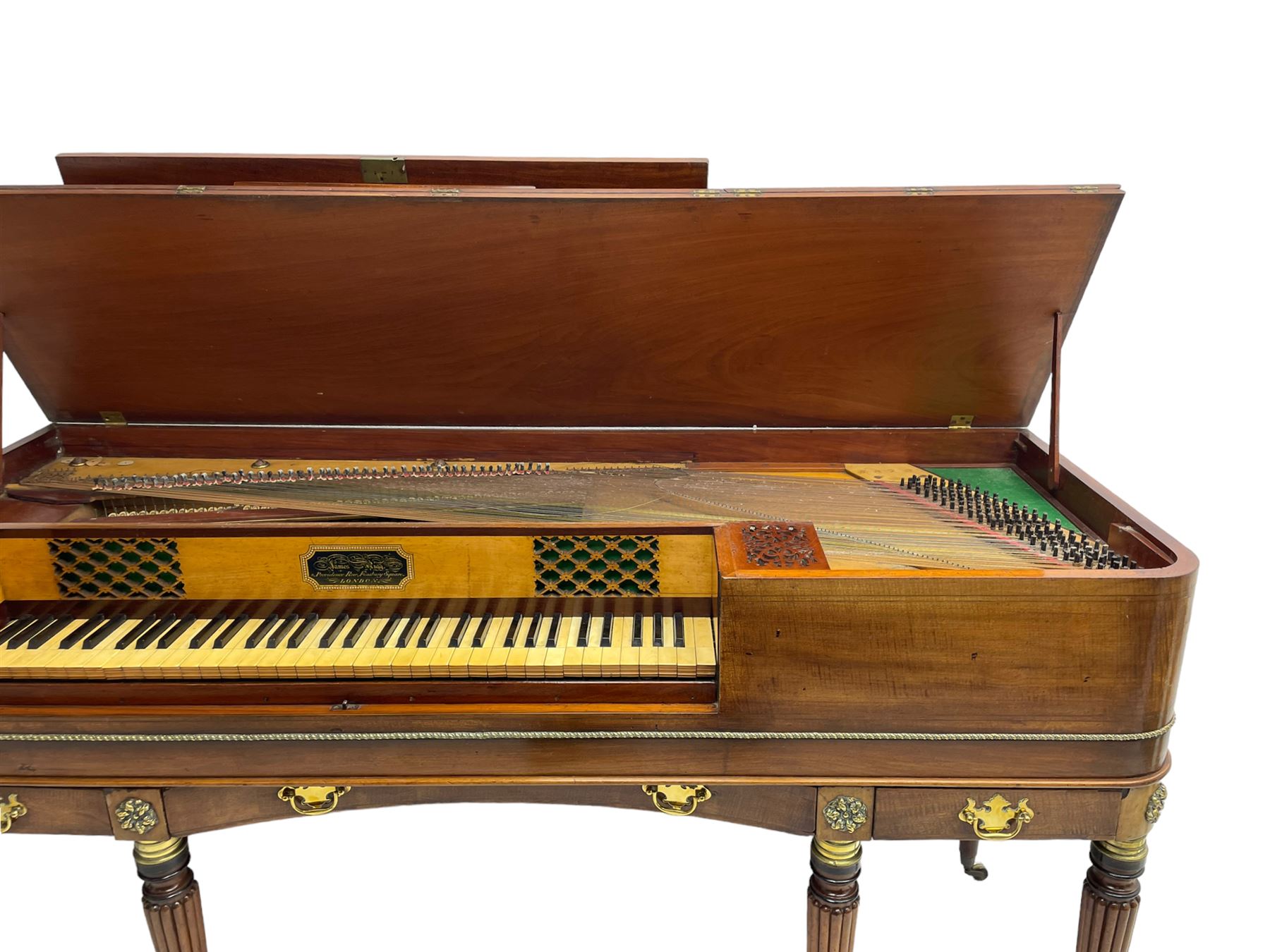 James Rigg, London -early 19th century mahogany and maple square piano c1817, with a 68 key compass (A-C) original hammers, jacks and felt, satinwood interior with ebony and ivory keys, the fretwork interior back inscribed 'James Rigg, 3 Providence Row, Finsbury Square, London', decorated with twist gilt metal edging, fitted with three drawers, on Gillows design turned and reeded supports with brass cups and castors.

This item has been registered for sale under Section 10 of the APHA Ivory Act