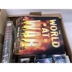 Three boxes of books, periodicals and DVDs of military interest with particular emphasis on WW2 including The History of World War Two in thirty original parts by Orbis, The D-Day Experience by Richard Holmes, The World War Two Databook, The World at War, Special Forces etc