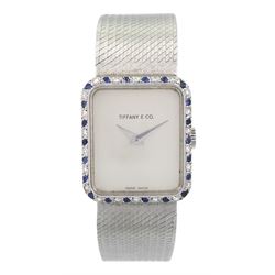  Tiffany & Co ladies 18ct white gold manual wind wristwatch, movement by Chopard, diamond and sapphire bezel, case stamped 18K with Helvetia hallmark, on 18ct white gold integral bracelet, stamped 750