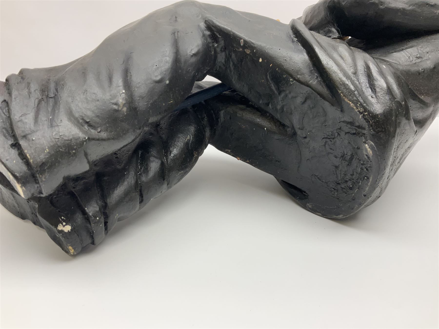 Large painted composite figure of Charlie Chaplin, seated upon wooden chair, H54cm