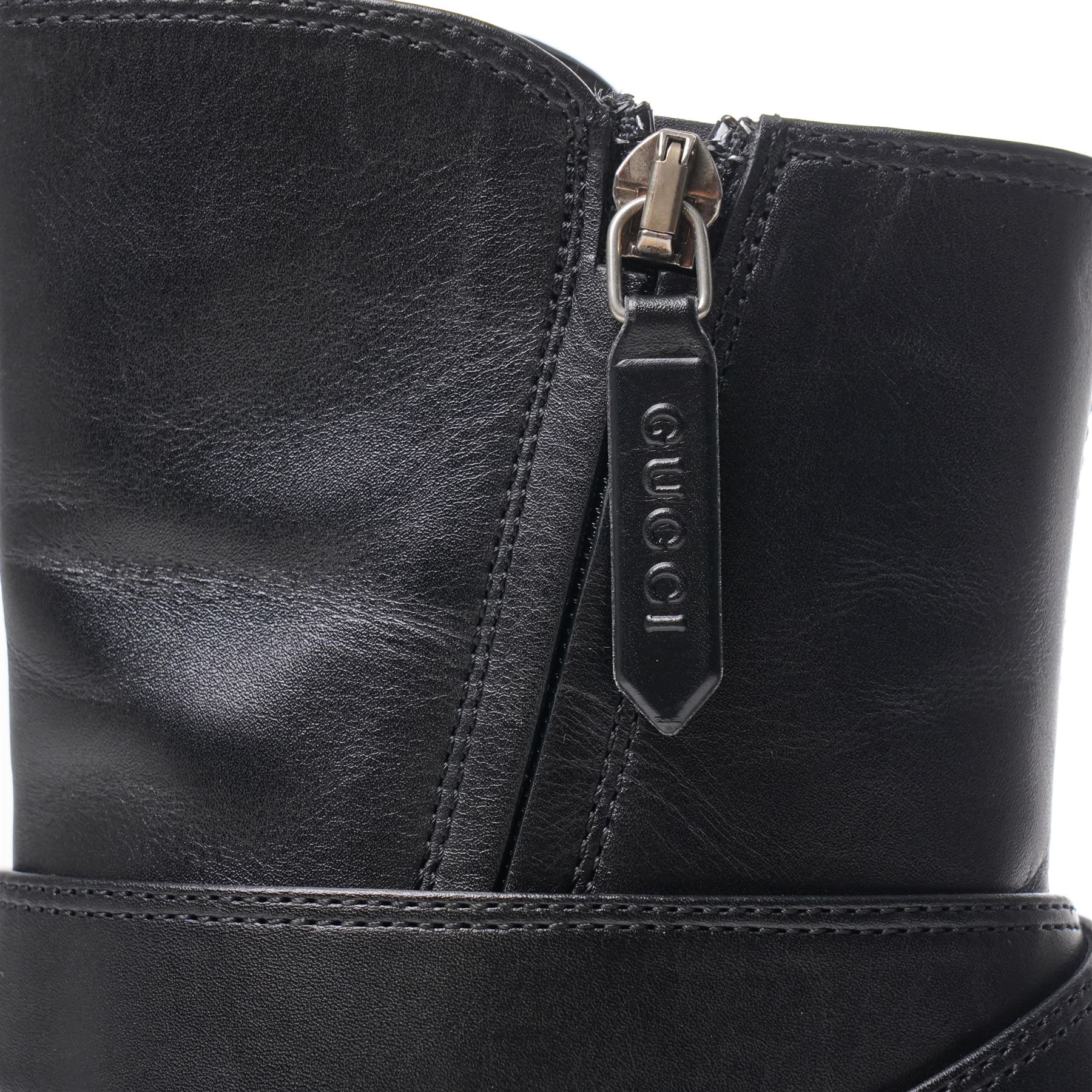 Gucci - pair of Dionysus ankle black leather boots with block heels, with signature silver tone tiger head buckle fastening and full length zip, size 37½, total boot height 24cm, with original box and dust bags