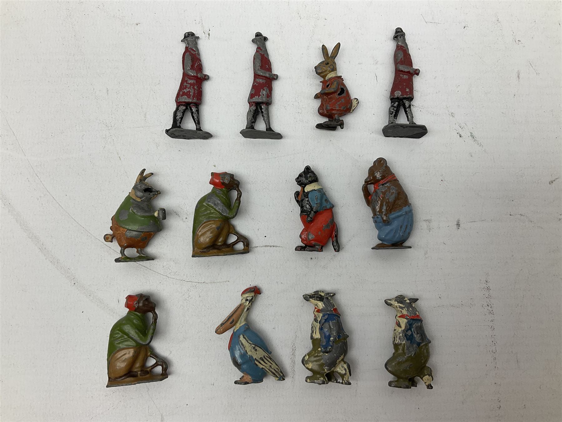 Collection of twenty-two Britains Cadbury's Cococubs play worn lead painted figures to include Mr Pie Porker, Mrs Pie Porker, Tiny Tusks, Captain Kangaroo, Granny Owl and others, Britains Snow White and Doc lead figures and other painted lead figures (30)