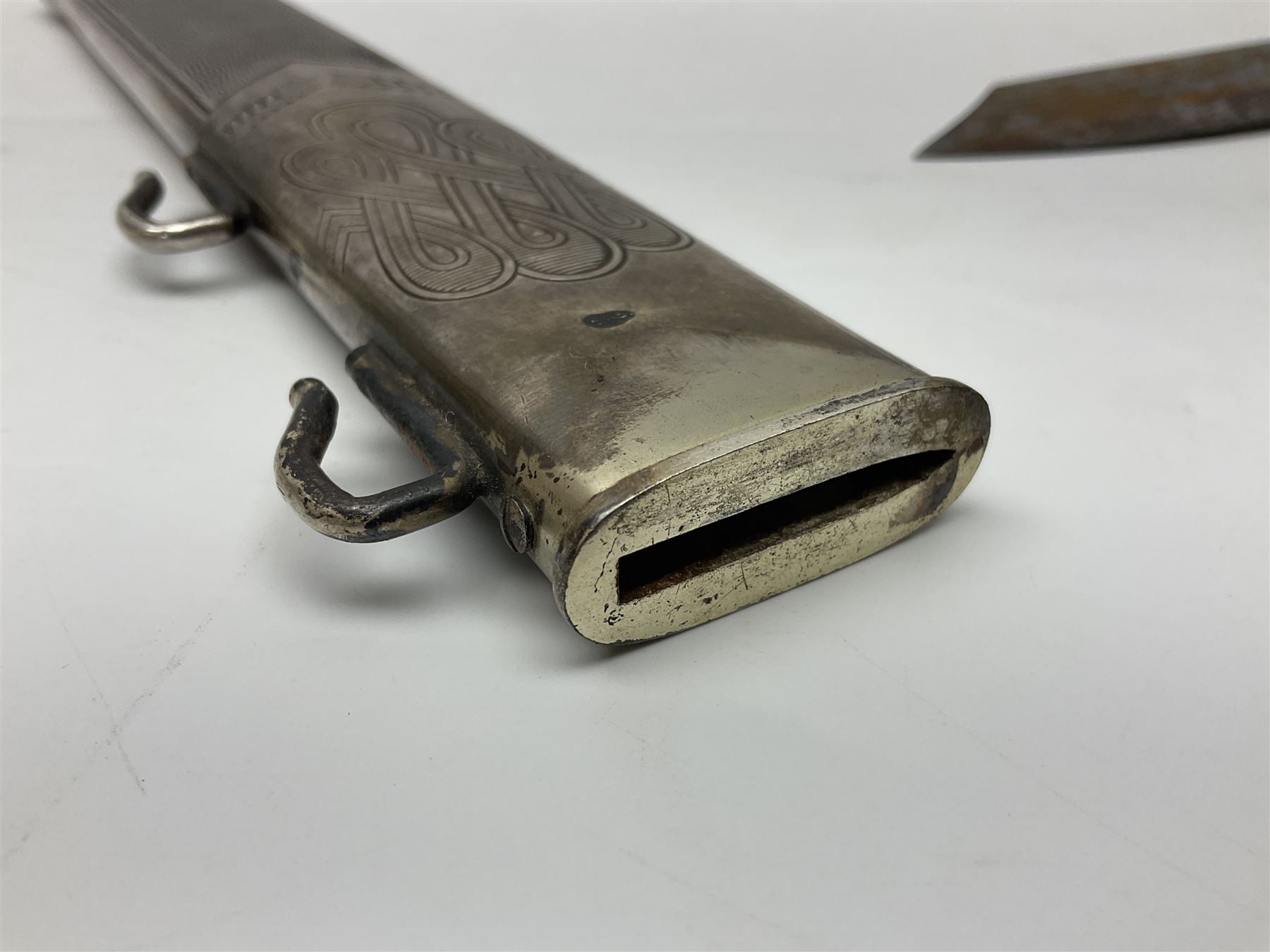 WW2 German RAD (Reichsarbeitdienst) Leader's hewer dagger,  the 25.5cm fullered steel blade engraved Arbeit Adelt (Work Enables) with Eickhorn squirrel maker's mark; scrolling cross-piece, mahogany grip and eagle pommel; in decorative plated scabbard L40cm overall.