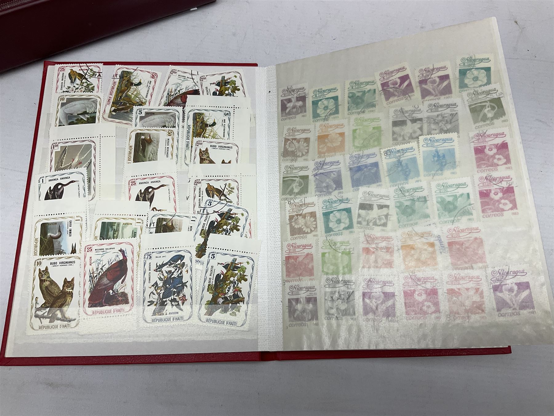 Various Royal Mail PHQ cards, first day covers, World stamps including Poland, Uruguay, Pakistan etc, housed in sixteen albums / folders, in one box
