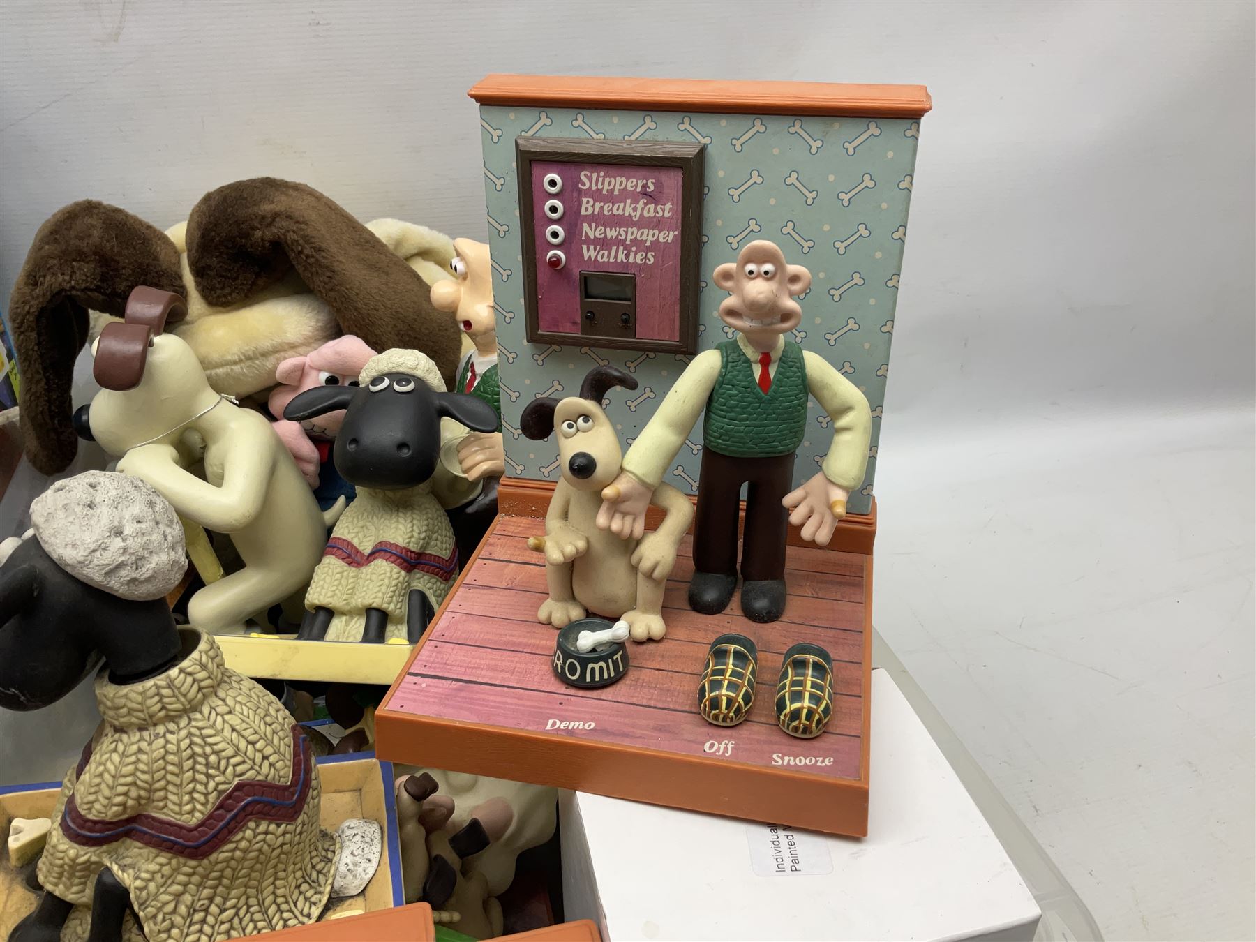 Large collection of Wallace & Gromit collectables, including four Born to Play  figures, clocks, composite figures, etc, in four boxes   