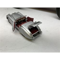 Four Franklin Mint Precision Models, one with hardwood body; large reproduction model of a vintage racing car L52cm; and four other modern metal/wooden models of vintage cars; all unboxed (9)