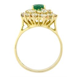 14ct gold emerald and diamond cluster ring, single oval cut emerald of approx 1.05 carat, surrounded by two rows of twenty four round brilliant cut light yellow diamonds, total diamond weight approx 2.35 carat