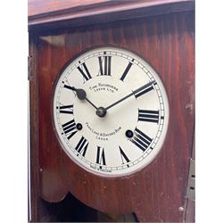 Early 20th century oak cased time recorder, circular Roman dial signed 'Time Recorders Leeds Ltd. Park Lane & Oxford Row Leeds', the glazed door signed 'National Time Recorder Co Ltd. London...'