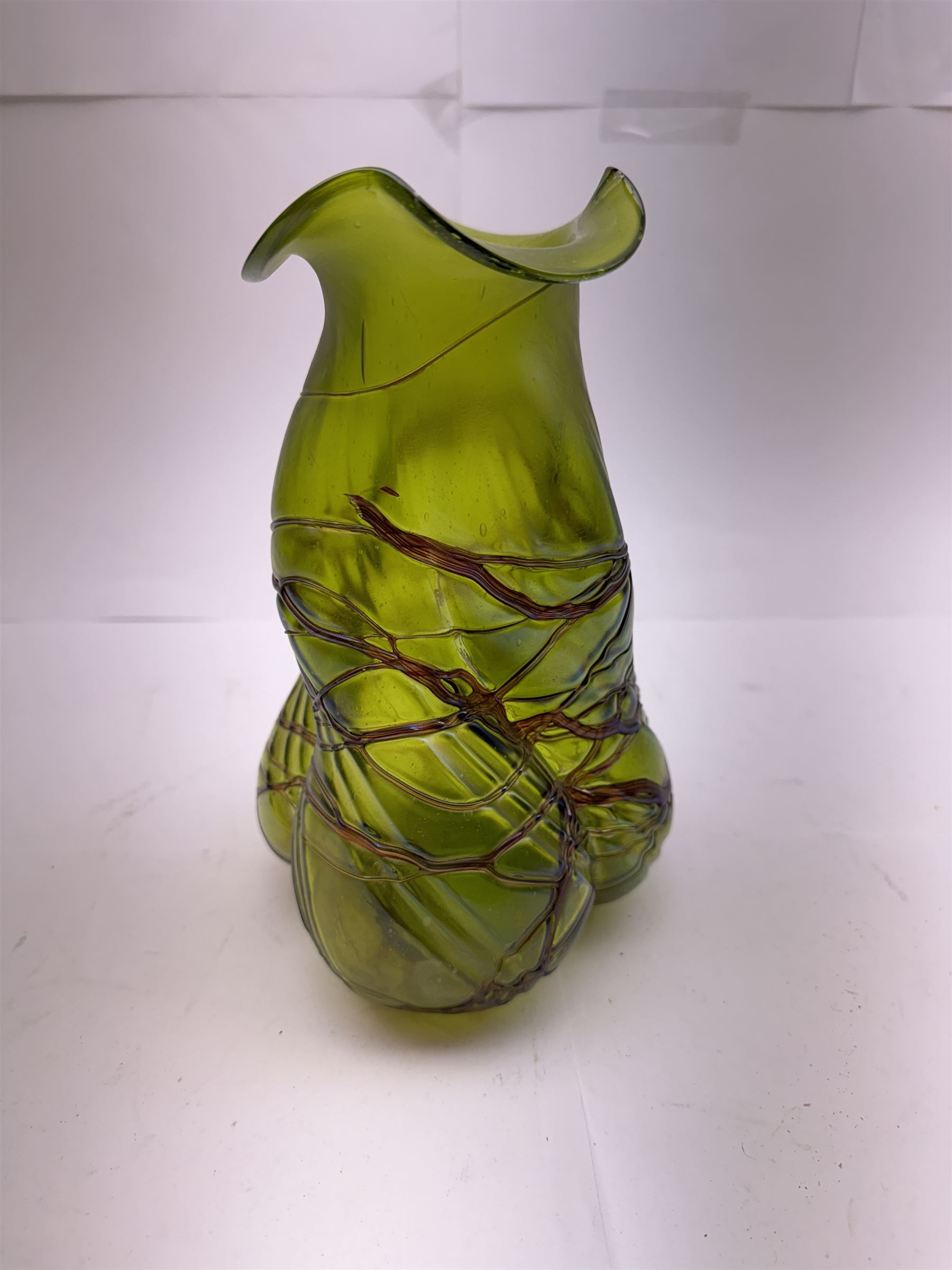 Three Austrian Art Nouveau green iridescent glass vases, to include two Pallme-Konig examples and a Kralik example, each with threaded vein decoration, tallest H25cm (3)