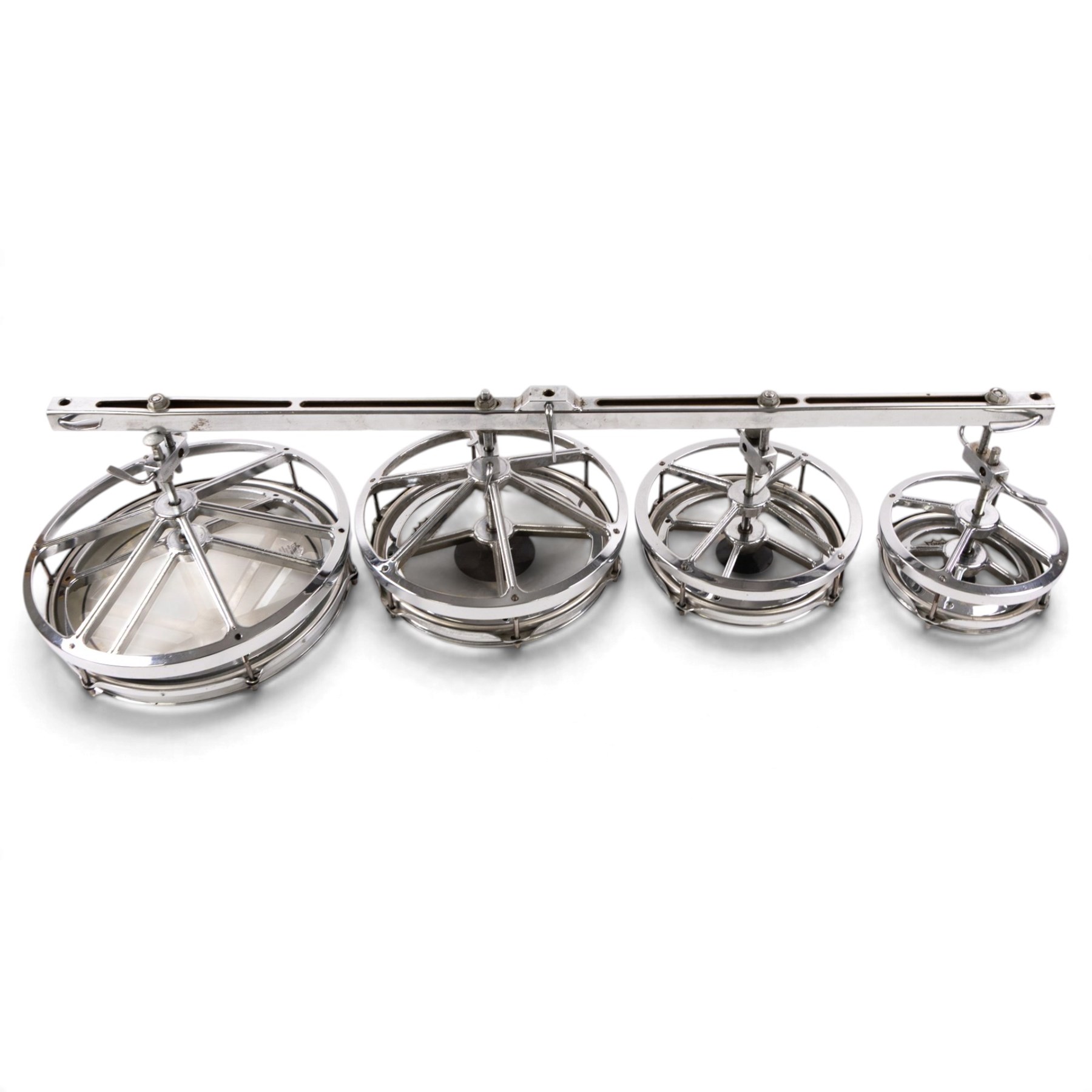 Set of four Remo Roto Toms, with Weather King CS batter heads and chrome tension frames, contained within a fitted carrying case