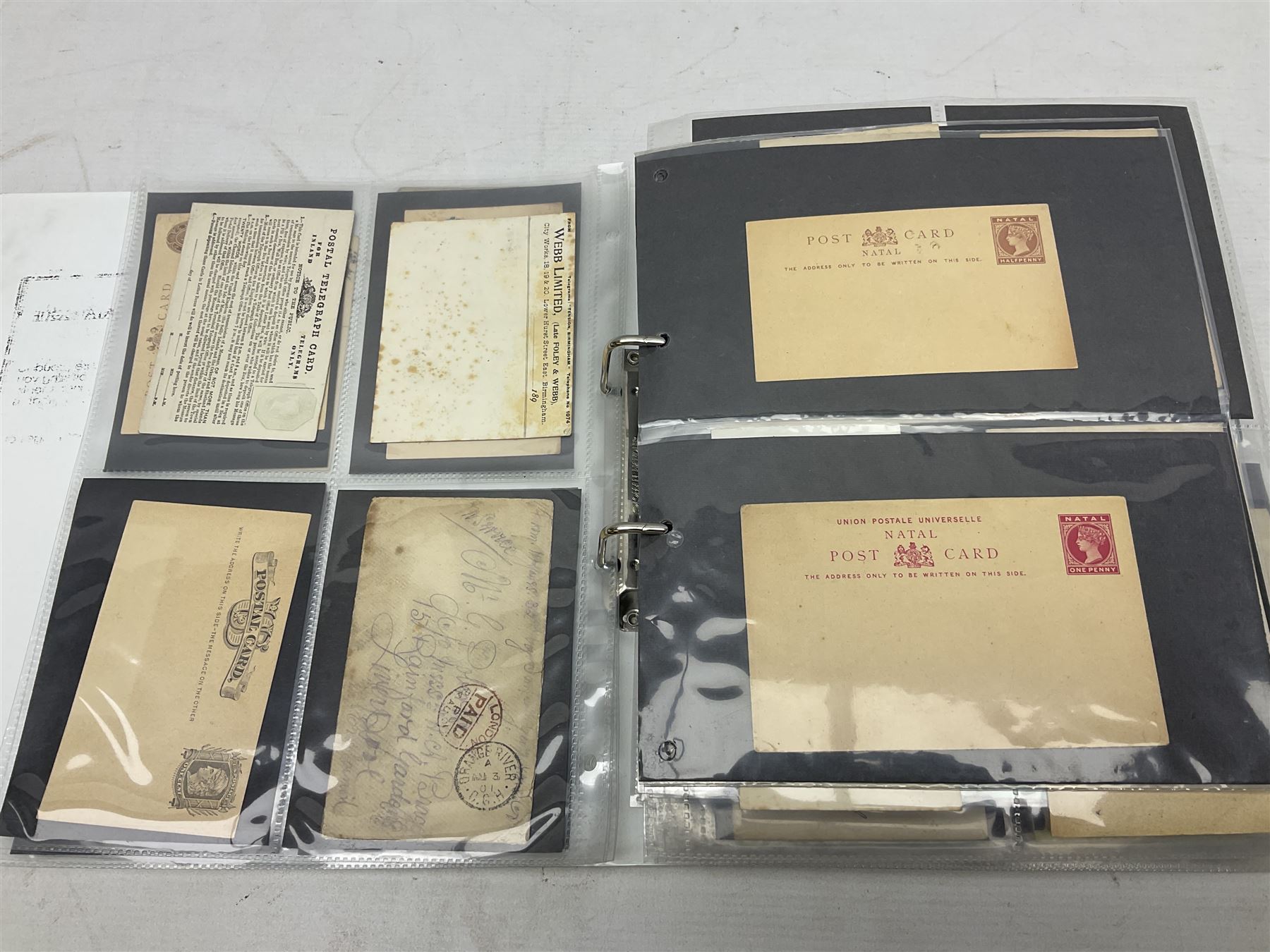 Queen Victoria and later Great British and World postal history, including postal stationary, mourning covers, QV Natal one penny stamps on cover, registered letters, postmark interest etc, housed in a ring binder folder