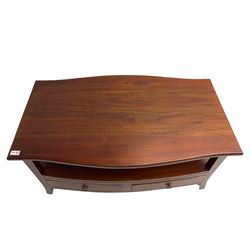 Hardwood serpentine coffee table, fitted with four drawers