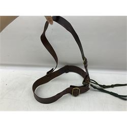 British Army Officers Sam Browne leather belt with shoulder strap; and webbing belt with Potter London Staybrite buckle for 19th Regiment of Foot (Green Howards) with various markings (2)