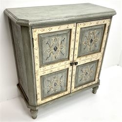 Contemporary painted cabinet, moulded rectangular top with canted corners over two panelled doors with painted decoration, on turned feet