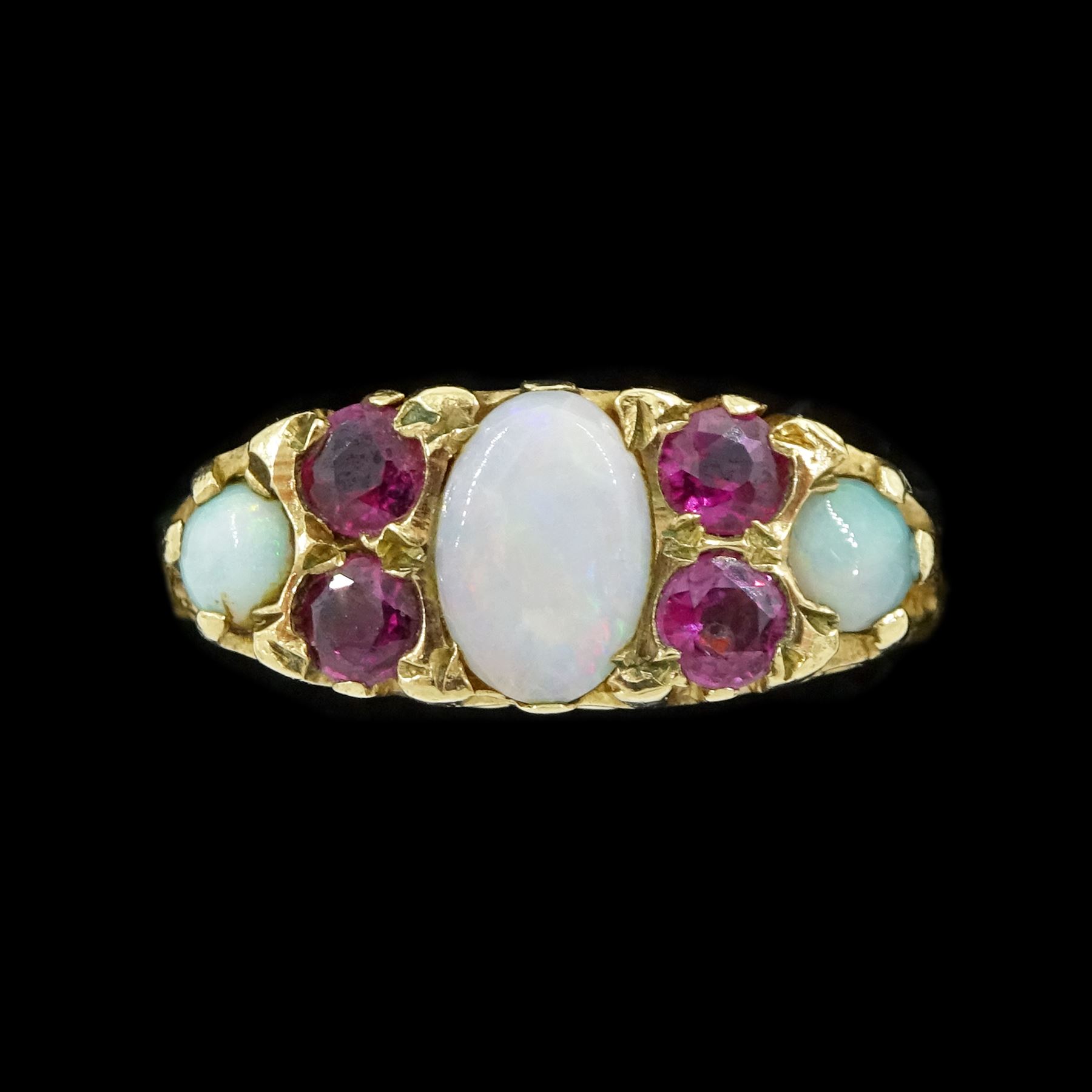 9ct gold three stone opal and four stone ruby ring, Birmingham 1976