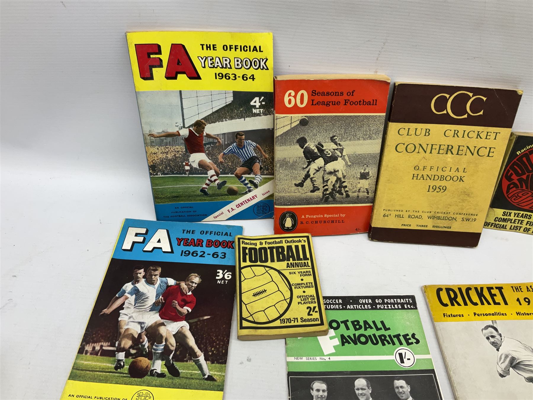 Football - Sherman's Searchlight on Famous Teams trade cards 1938-39 (28) and Searchlight on Famous Players (15); and nine booklets including F.A. Cup Annual 1951;two early 1960s F.A. Yearbooks etc; together with seven photographs of cricket teams, first half of 20th century; and four 1940s and later cricket booklets; and a signed postcard of boxer Len Harvey