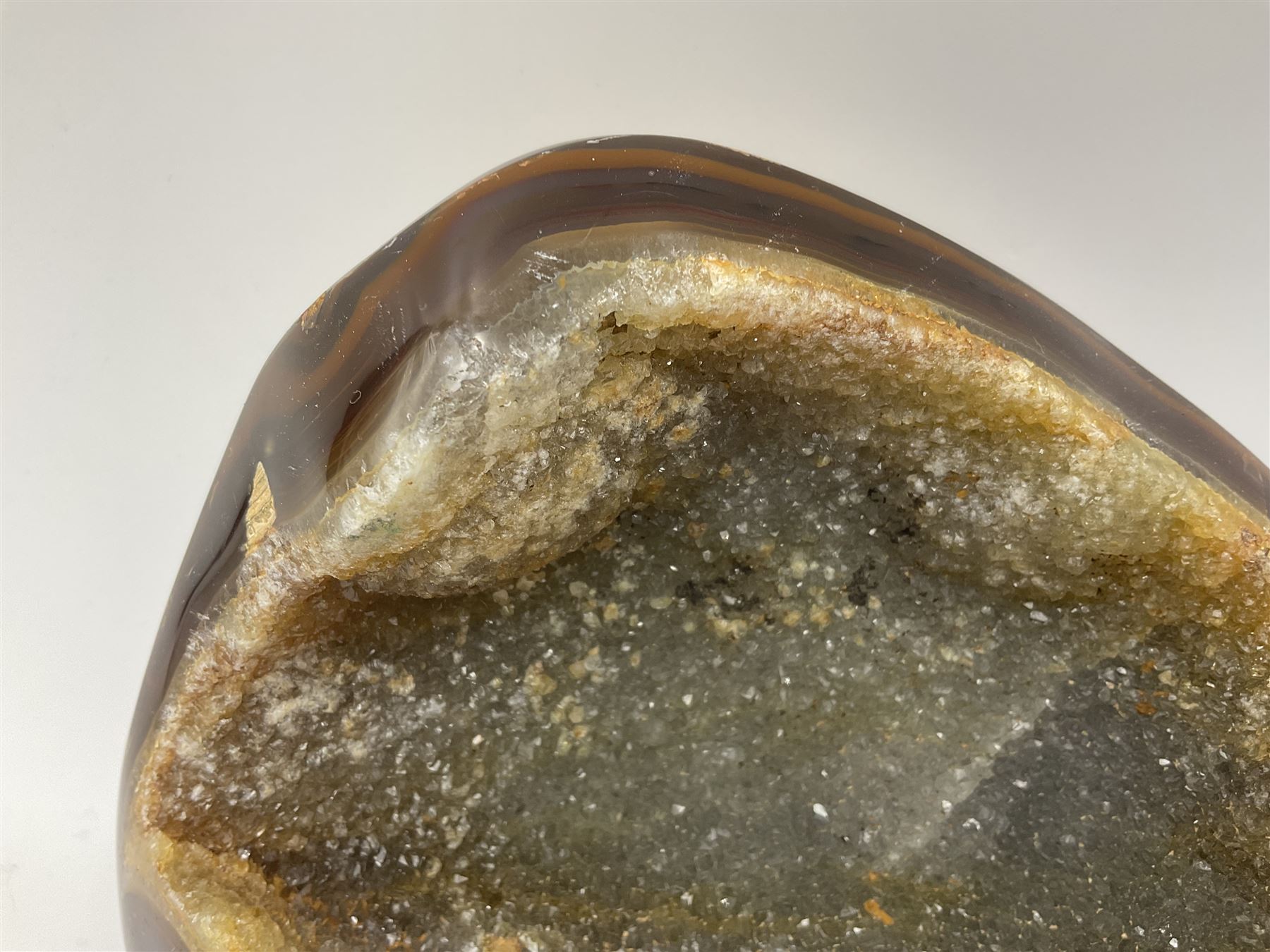 Agate crystal geode cluster, with crystals to the centre, in brown and grey tones, H7cm 