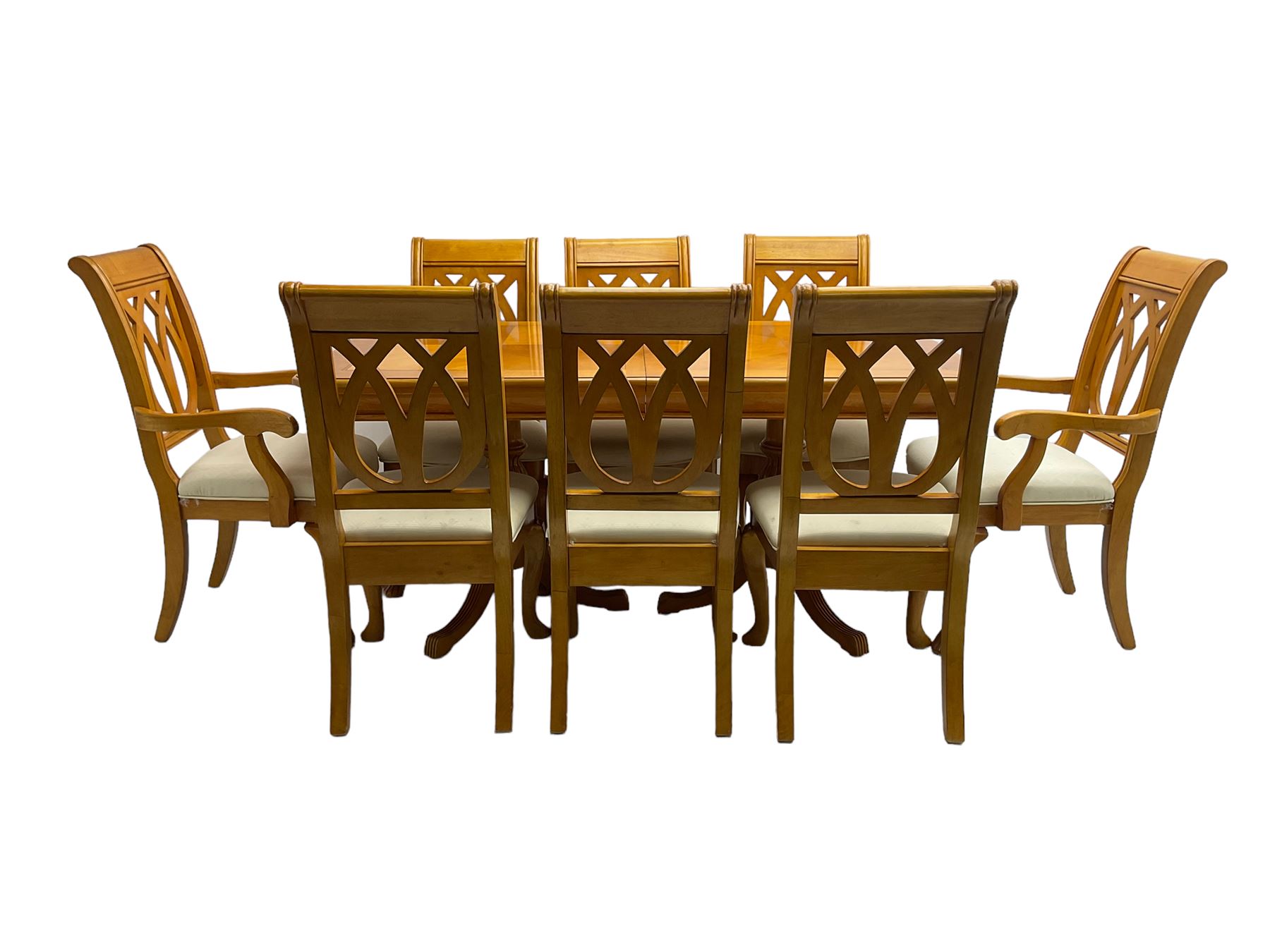 Yew wood extending twin pedestal dining table, rectangular top with ebony stringing over turned and reeded vasiform pedestals on tripod bases, with two additional leaves (W159cm D92cm); and set of eight (6+2) matching dining chairs, high pierced backs over seats upholstered in ivory fabric, on cabriole supports (W57cm H101cm)