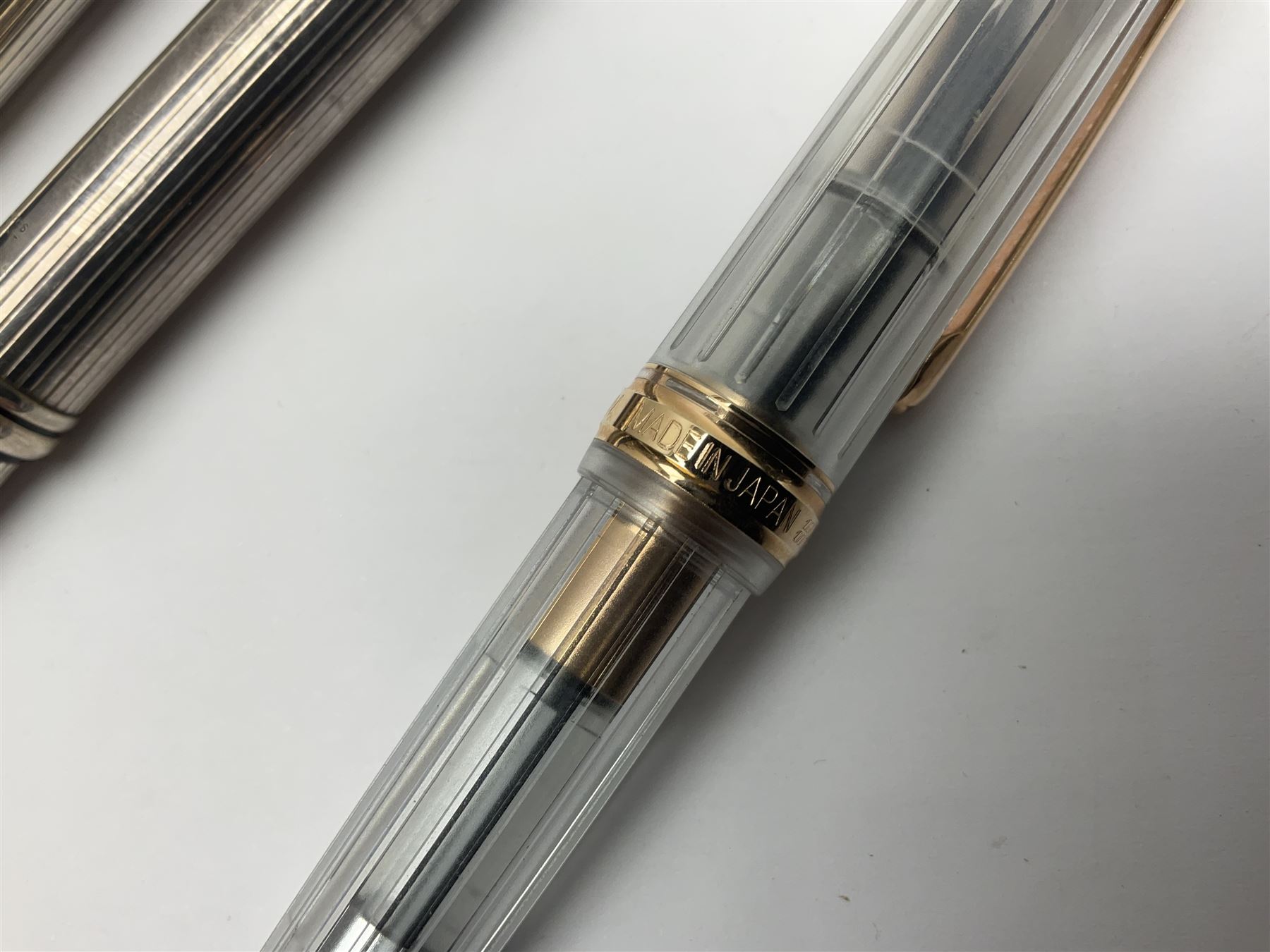 Cross sterling silver fountain pen, having fluted barrel and cap, stamped 