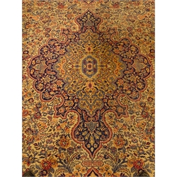  Large early 20th century Wilton rug carpet, central medallion, floral field, repeating border, 361cm x 315cm  
