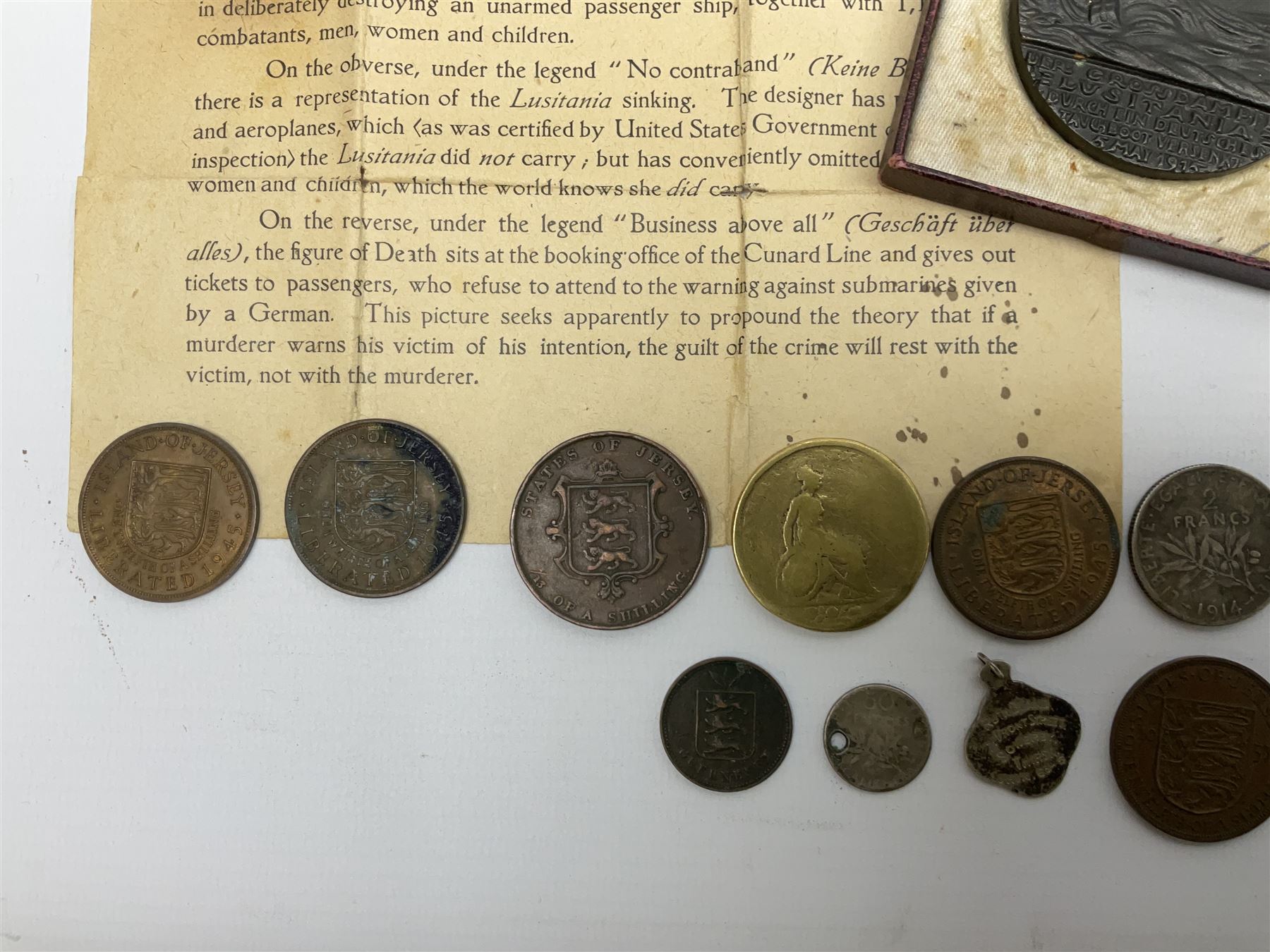 Lusitania replica medal, boxed and various coins including King George VI 1951 Festival of Britain crown, United States of America 1844 one cent and 1850 half dime, Queen Victoria States of Jersey 1844 one thirteenth of a shilling, etc