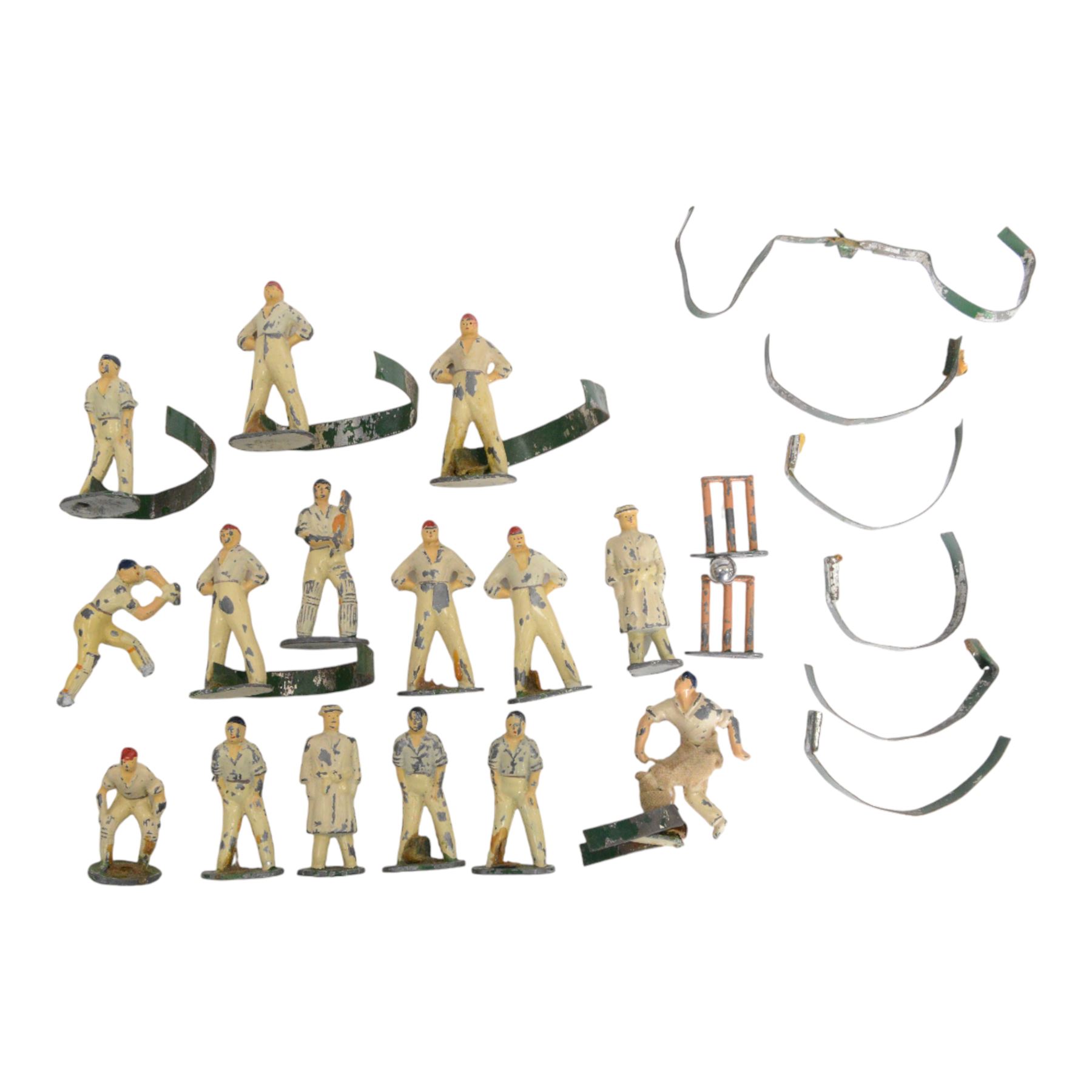 1940s Tulltoy by Phillip Segal Toys 'Real Cricket in Miniature' circa 1947, includes thirteen lead cricketers, six with red hats and seven with blue, two umpires, two sets of wickets, one metal ball, felt cricket pitch with white stitching and metal batting and bowling fixtures, contained within original box