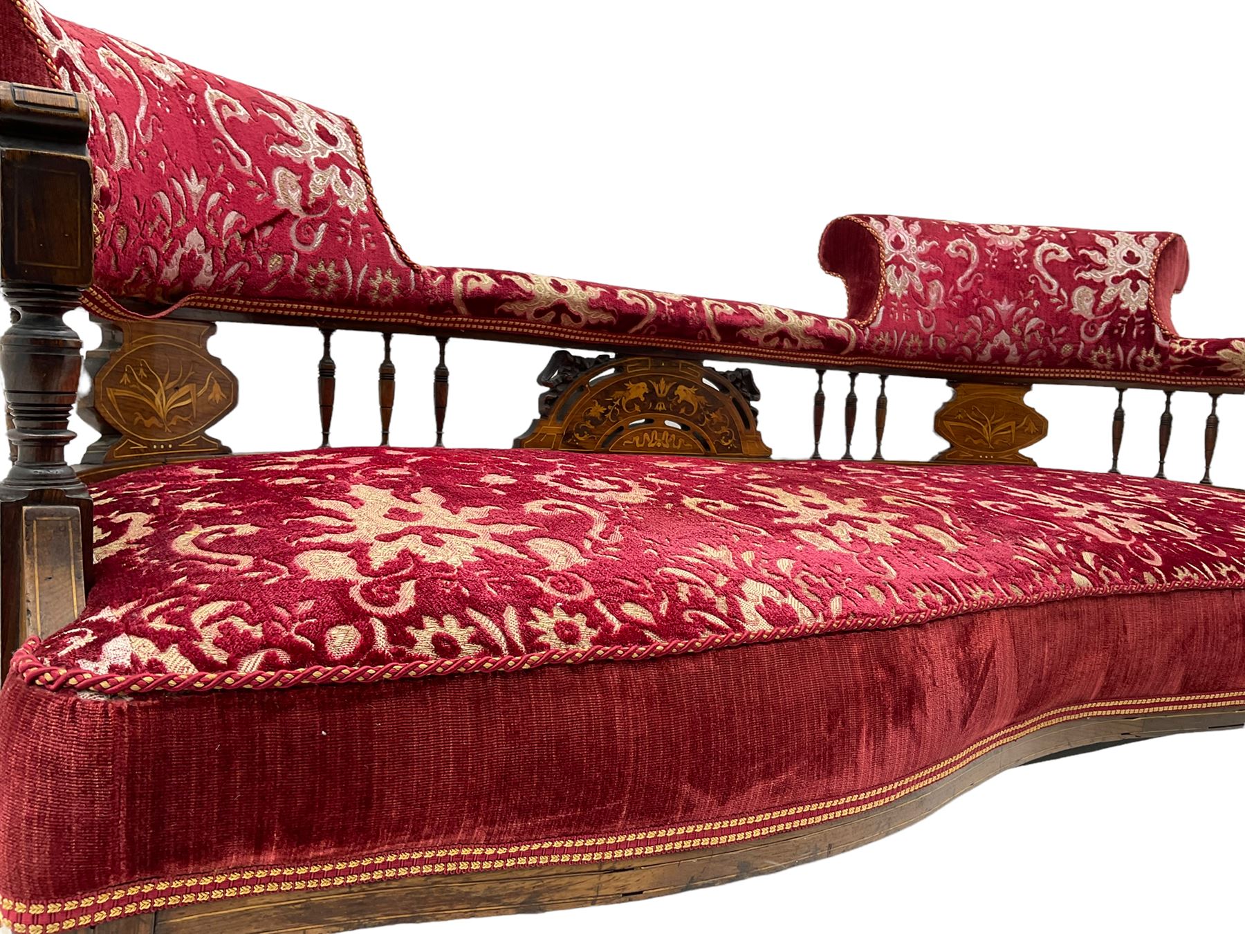 Edwardian inlaid rosewood salon suite, upholstered in red and gold fabric, comprising two seat sofa, pair of tub shaped armchairs, and four side chairs