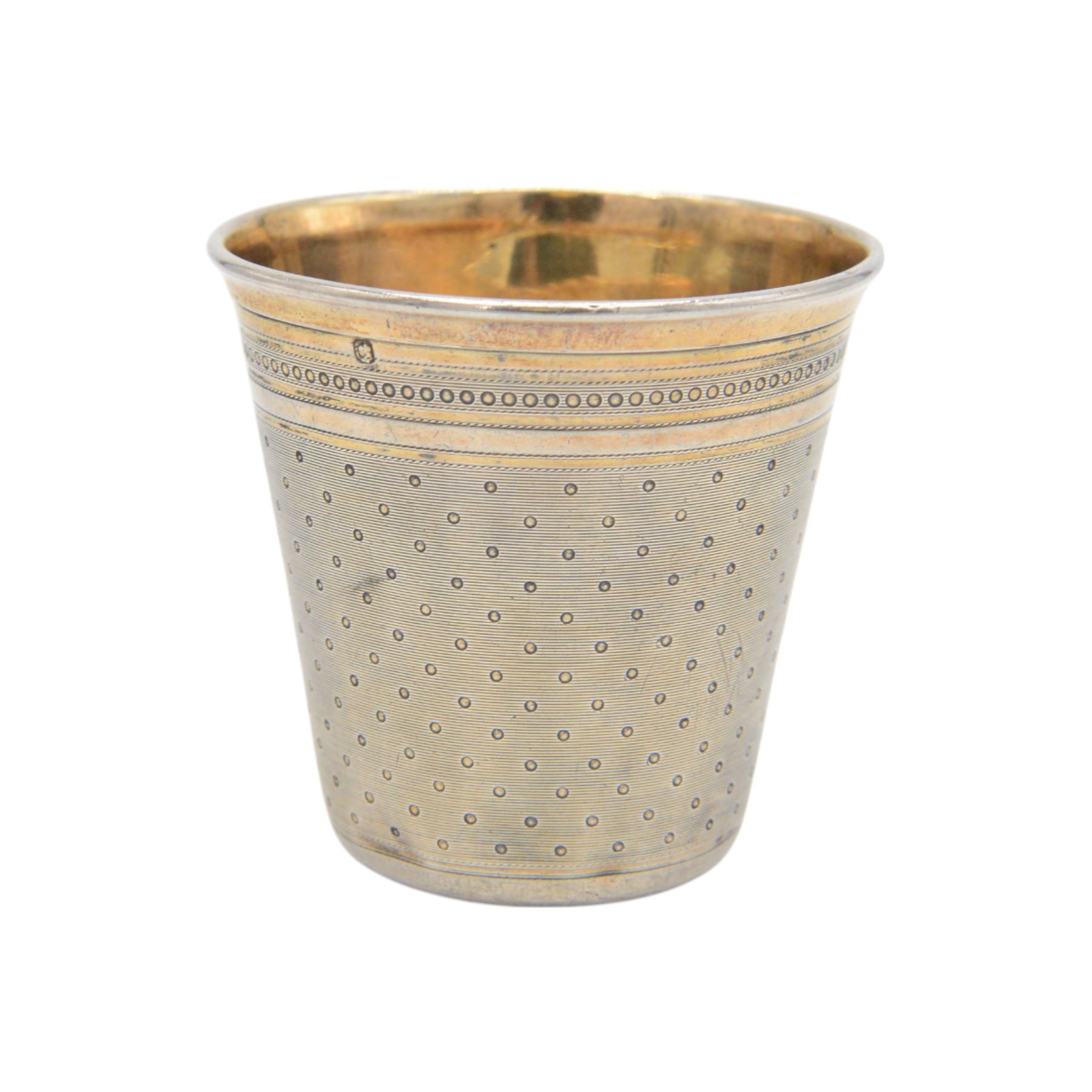 Early 20th century French silver wine tasting beaker, slightly tapered form with gilt interior, the body decorated with engraved monogram and engine turned pattern with makers mark for Emile Puiforcat, H6cm