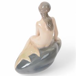 Royal Copenhagen Figure The Little Mermaid no. 4431 together with two Girl on Stone no . 4027  