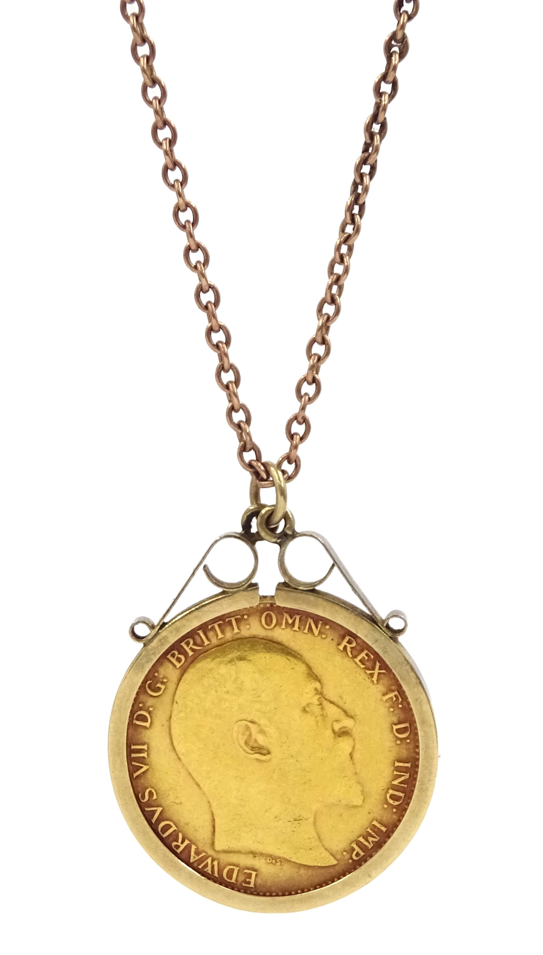 King Edward VII 1910 gold full sovereign coin, loose mounted in gold pendant, on rose gold chain, both 9ct