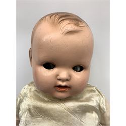 Seyfarth & Reinhardt composition head baby doll with moulded hair, sleeping flirty eyes, open mouth with one tooth and tongue and soft body with composition jointed limbs, marked 'SuR Germany 30/5' H47cm; together with a Golborne Dolls 'Golborne Beauty' composition head and body bride doll, marked 'F.P.23' in original box H63cm (2)