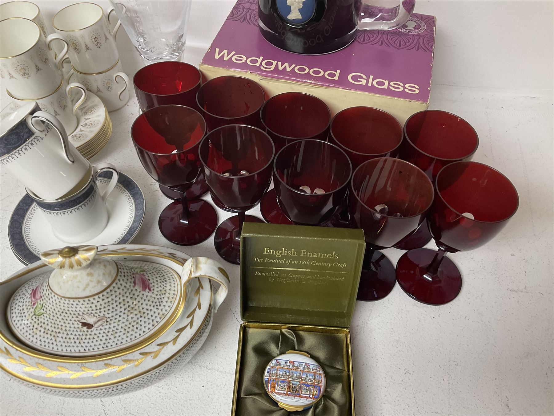 Twin handled sucrier with cover, in the manner of Thomas Grainger for Royal Worcester, together with Wedgwood Medina pattern coffee cans and saucers, a set of ten ruby glasses and a Wedgwood cameo glass tankard etc