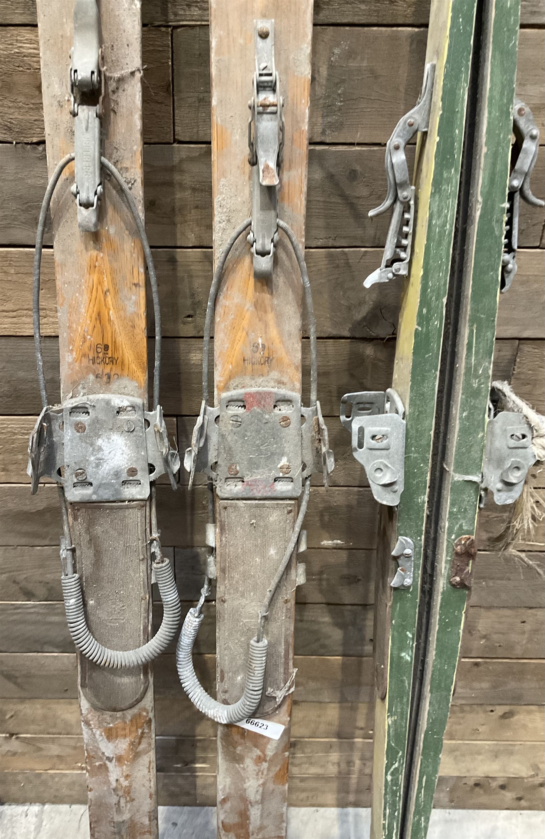 Two pairs of vintage skis, L207cm and 197cm