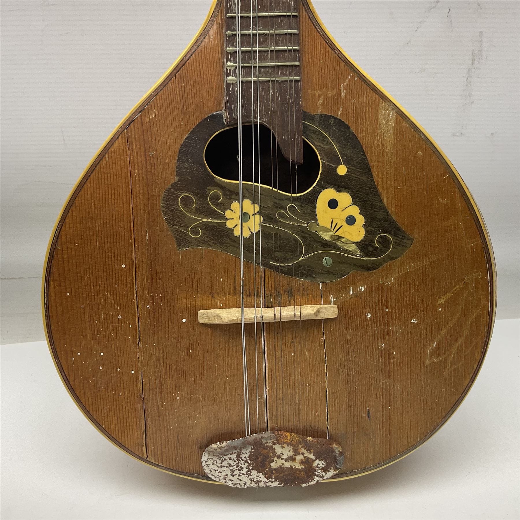 Italian eight-string mandolin with maple back and ribs and spruce top with inlaid floral marquetry panel within a fragmented mother-of-pearl border L61cm; cased; and a (damaged) German 'Michigan' mandolin for spares or repair (2)