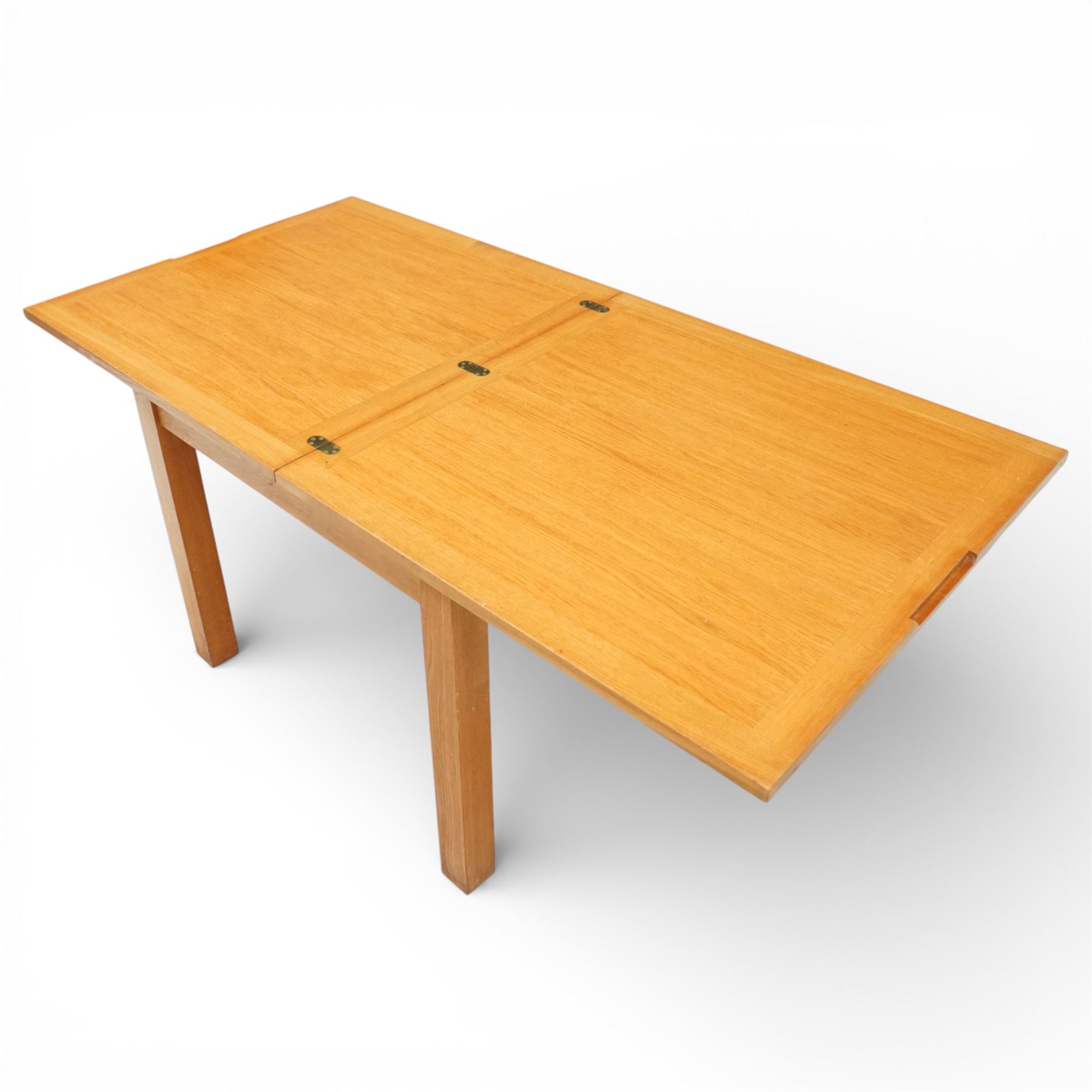 Laura Ashley - extending oak dining table, rectangular top with sliding hinged leaf, raised on square section legs