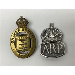 Services Rendered badge No.226003; WW1 'On War Service' badge dated 1915 No.86815; WW2 hallmarked silver ARP badge London 1939; Royal Naval Mine Watching Service badge; and pair of Royal Horse Artillery shoulder titles (6)