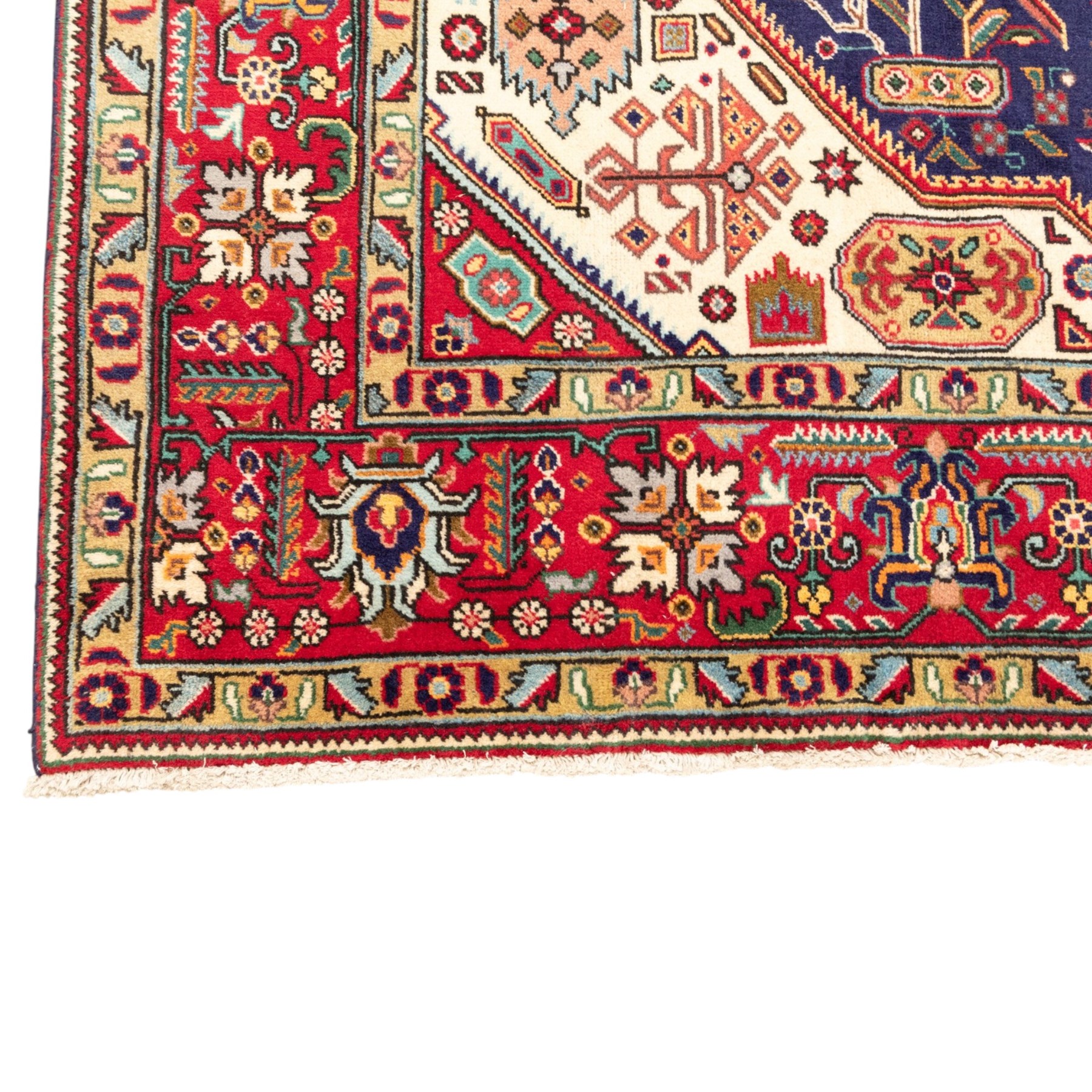 North West Persian carpet, the indigo field centred by a large terracotta and ivory medallion with matching pendants, decorated throughout with stylised palmettes, flowerheads and branching foliage, ivory geometric floral spandrels, enclosed by a red palmette border and narrow patterned guard bands