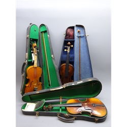  Mid-19th century Bohemian violin with 35.5cm one-piece maple back and ribs and spruce top (sound post crack), L59.5cm overall, in carrying case with bow together with 1950s Czechoslovakian violin and 1950s Saxony violin, both for restoration and each in carrying case with bow (3)  